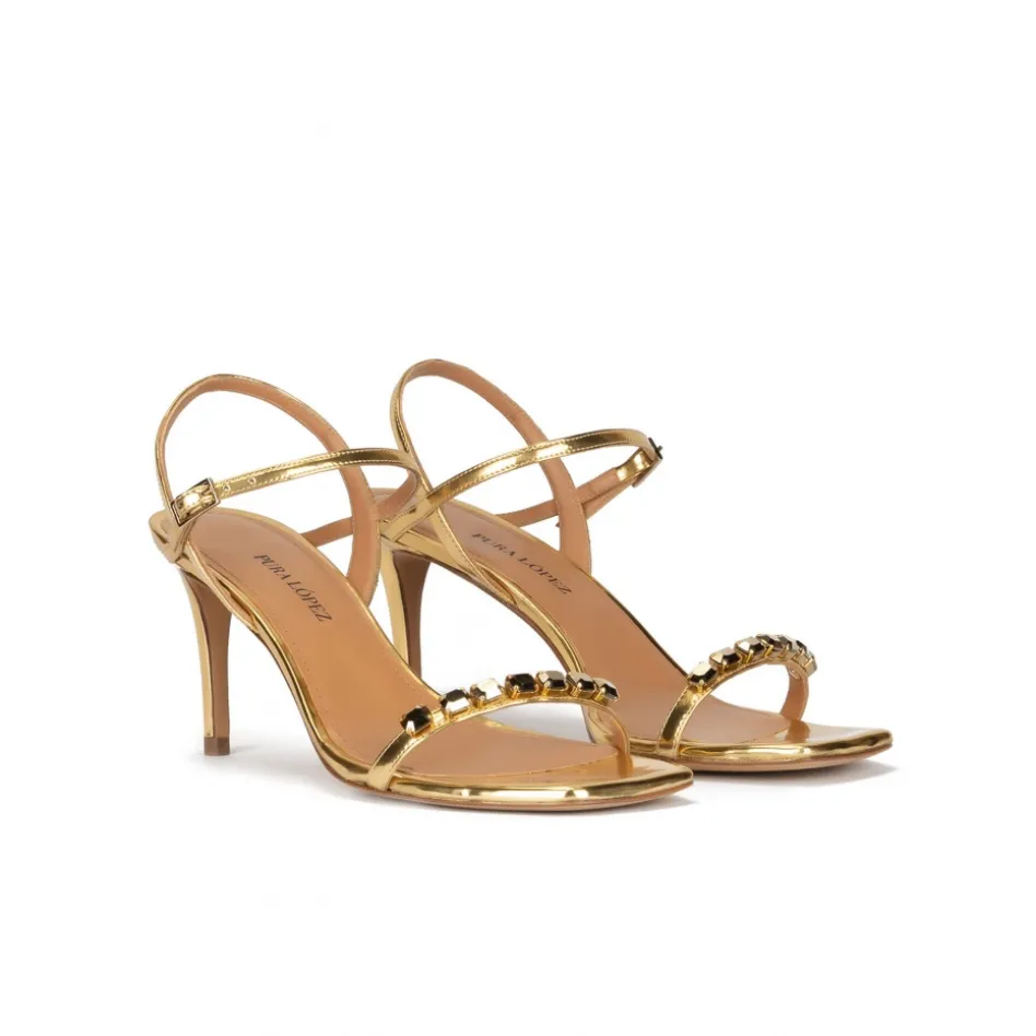 Evangelique Sandales à talons moyens en cuir doré à cristaux